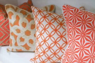 Assorted orange pillow patterns