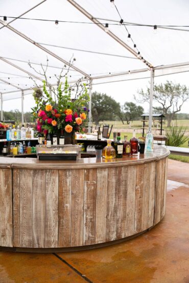 Durango Bar | Perch Event Decor Rental | Luxury Furniture Rentals in Dallas Texas | Round Rustic Wooden Bar for Weddings and Events