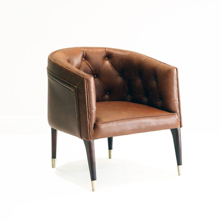 Henry Arm Chair | Perch Event Decor Rental | Luxury Furniture Rentals in Dallas Texas | Modern Curved Brown Leather Arm Chair Sleek and Masculine