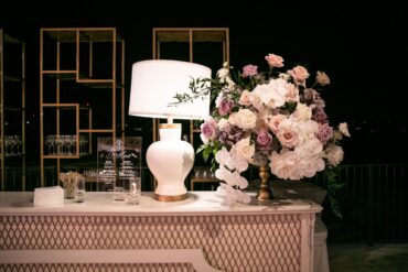 White and Gold Porcelain Lamp with Charleston Ivory Bar Facade and Gold Shelves at Omni Barton Creek Wedding | Verve Events | GRO Designs