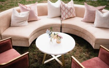 Charlotte Banquette with Emily Coffee Table, Blush Dakota Chairs, and Perch Pillows at a Nasher Sculpture Center wedding