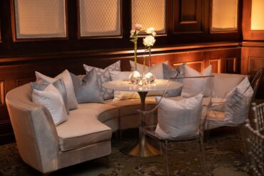 Charlotte Banquette with Perch Pillows, Marble and Gold Bistro Table, and Sky Arm Chairs at Dallas Country Club Wedding | Kirstin Rose Events