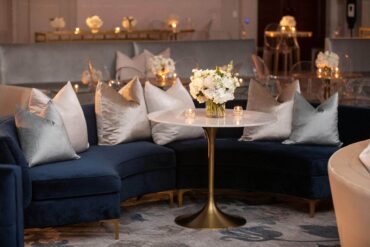 Natalie Banquette with Perch Pillows and Marble and Gold Bistro Table | Jordan Kahn Music Company Showcase | Jordan Kahn Orchestra Showcase at The Ritz Carlton Dallas