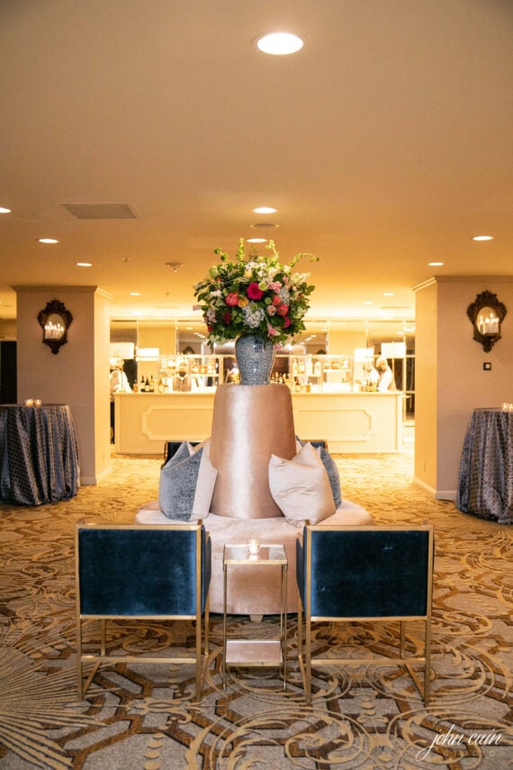 Kate Tete a tete with Aubrey Accent Table, Navy Dakota Chairs, WHITE 008, BLUE 046, Charleston Ivory Bar Facade, and Modern Gold Lamps at The Adolphus | Sarabeth Events