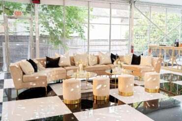 Extended Charlotte Banquette with Olivia Coffee Tables, Champagne Stella Stools, Perch Pillows, and El Dorado Bar | Kirstin Rose Events | Great Gatsby Party