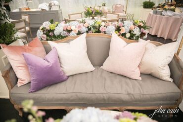 Highlands Sofa with PINK 020, PURPLE 001, IVORY 008, and IVORY 006 at East Ridge Country Club | The Colony House