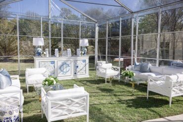 Convertible Hampton Bar Facade with Blue and White Porcelain Lamp, Lily Sofa, Lily Chair, Acrylic and Gold Coffee Table at The Hillside Estate | Hunter Orcutt Events | Three Branches Floral