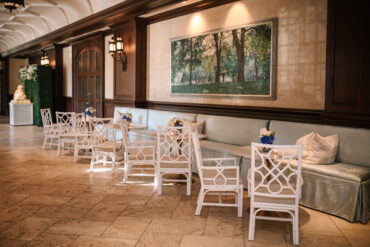 Madeline Banquettes with Marble and Gold Bistro Tables and Chelsea Chairs at Dallas Country Club | Garden Gate Floral