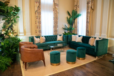 Oxford Sofas, Lindsey Coffee Table, Henry Arm Chair, and Emerald Stella Stools at Arlington Hall | Garden Gate Floral