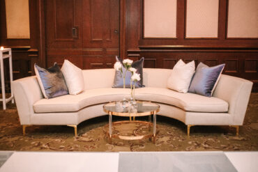 Lauren Banquette with BLUE 041 and WHITE 008 pillows and Brittany Coffee Table at Dallas Country Club | Garden Gate | Caroline Jurgensen Photography