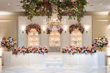 Arched Backline and Hampton Stage Facade at Brook Hollow | Three Branches Floral