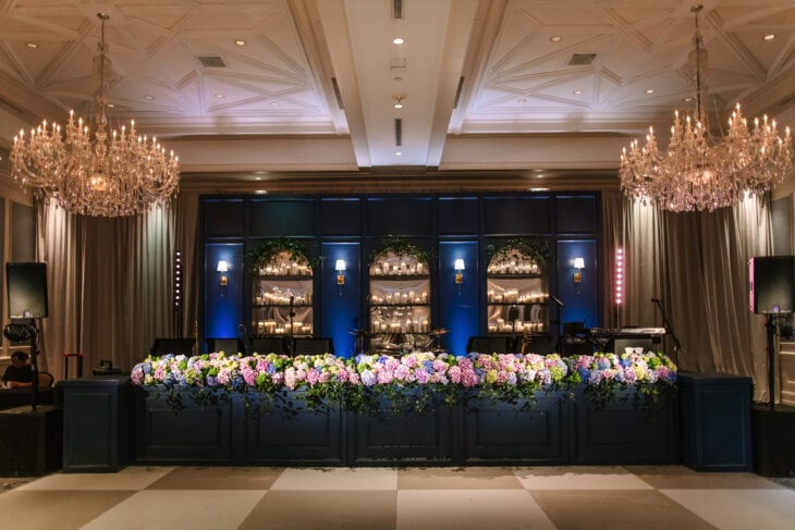 Hildebrand Backline with the Carmel Stage Facade at Dallas Country Club | Garden Gate Floral