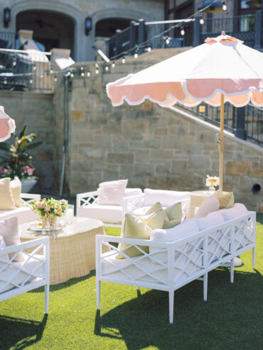 Lily Sofa with Rattan Coffee Table at Dallas Country Club | Three Branches Floral | Ash Event Co