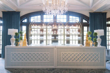 White Lattice Bar with White and Acrylic Lamps and Gold Curved Shelves at Dallas Country Club | Three Branches Floral | Ash Event Co