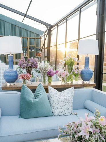 Macy Sofa with Kelsey Coffee Table, Beige Sisal Rug, Phillip Arm CHair, Tuscany Console Table, and Blue Gourd Lamp at the Dallas Arboretum | Ann Travis Events