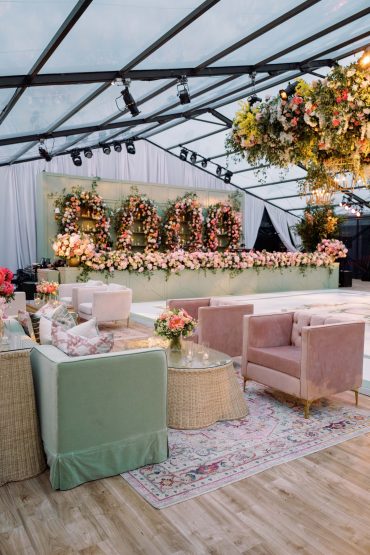 Rattan Coffee Table with Wynn Chairs and Lynn Rug | Jackson Durham Events | Sandone Tents