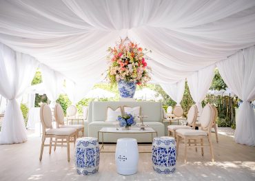Poppy Banquette with Marble Bamboo Coffee Table, Edward Dining Chairs, White Garden Stool, Blue and White Stool, and WHITE 006 pillows at private residence in Austin, Texas | Pearl Events