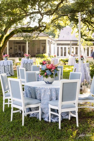 White Arthur Dining Chair with Light Blue Linen Cushions at a private residence in Louisiana | The Colony House
