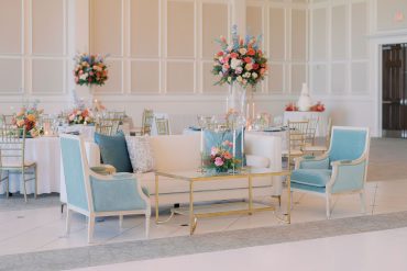 Linen Sophia Sofa with Gold and Glass Coffee Table and Green Louis Arm Chairs at The Bowden | Clara Elaine Events