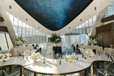Bradley Dining Table- Serpentine at Dallas Petroleum Club | Karis Concepts