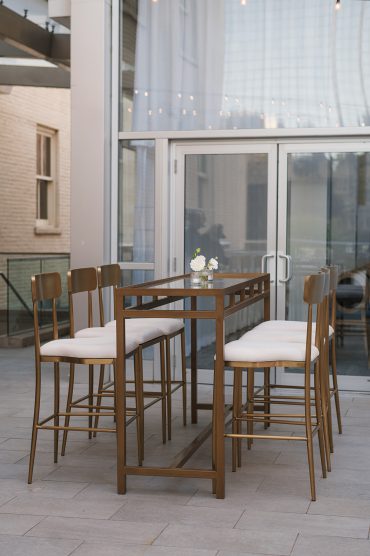 Gold and Mirrored Communal Table with Talaber Barstools at The Joule | Rachel Willis Events